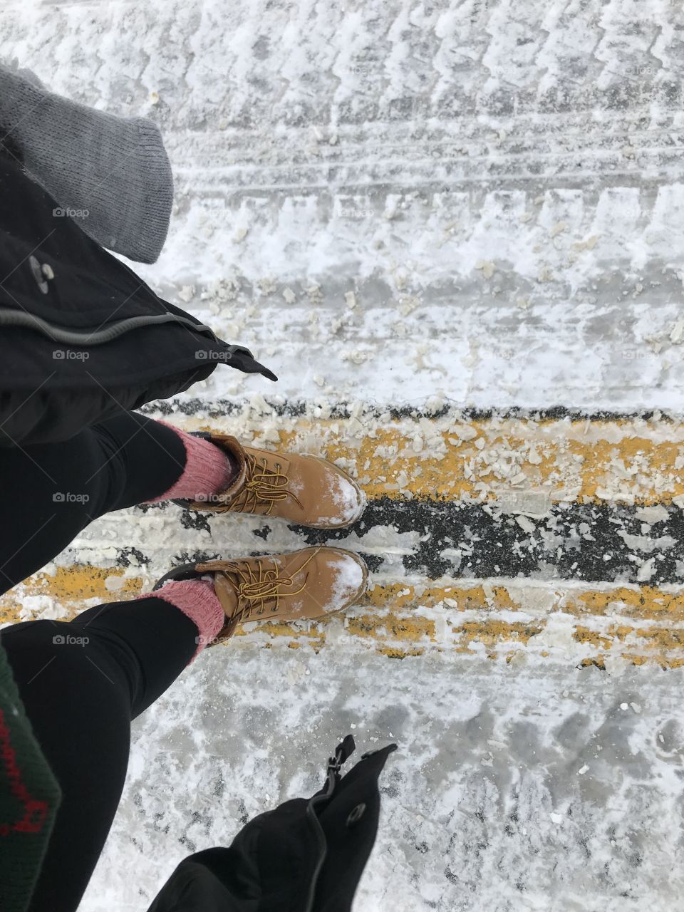 Standing in a snowy road