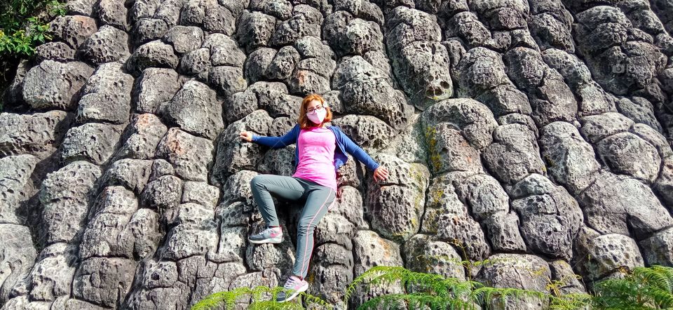 under an ancient lava waterfall.