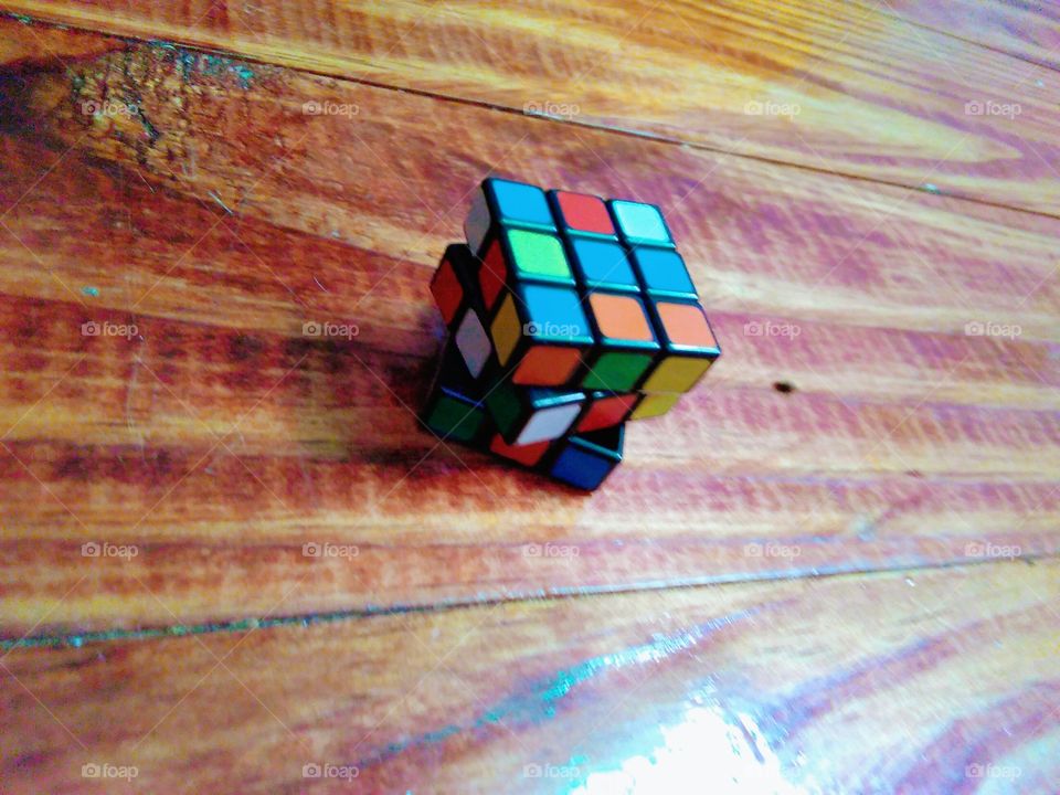 rubrics cube on a wooden floor