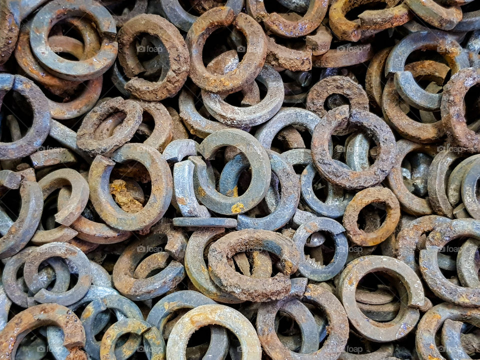 old rusty round washers background.  shapes in industrial world concept!