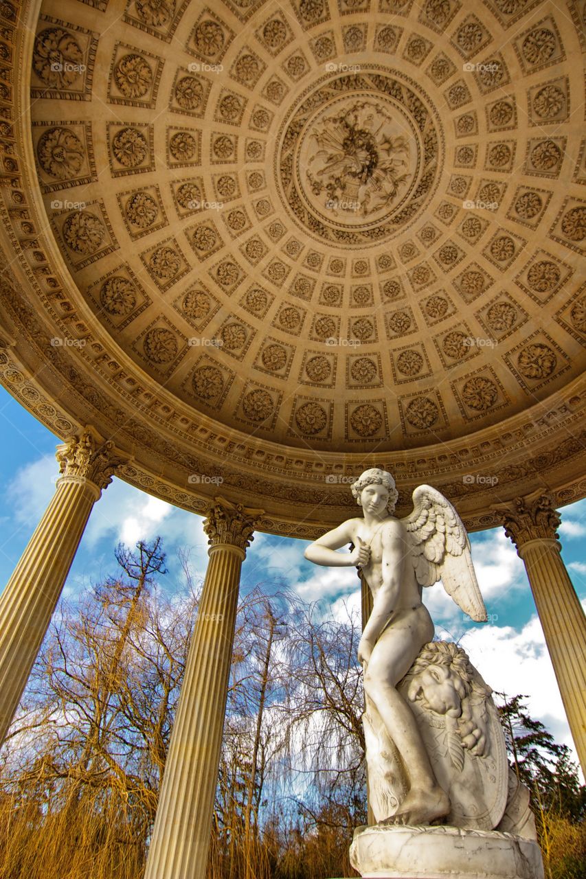 Apolon statue in Versailles gardens near Paris France
