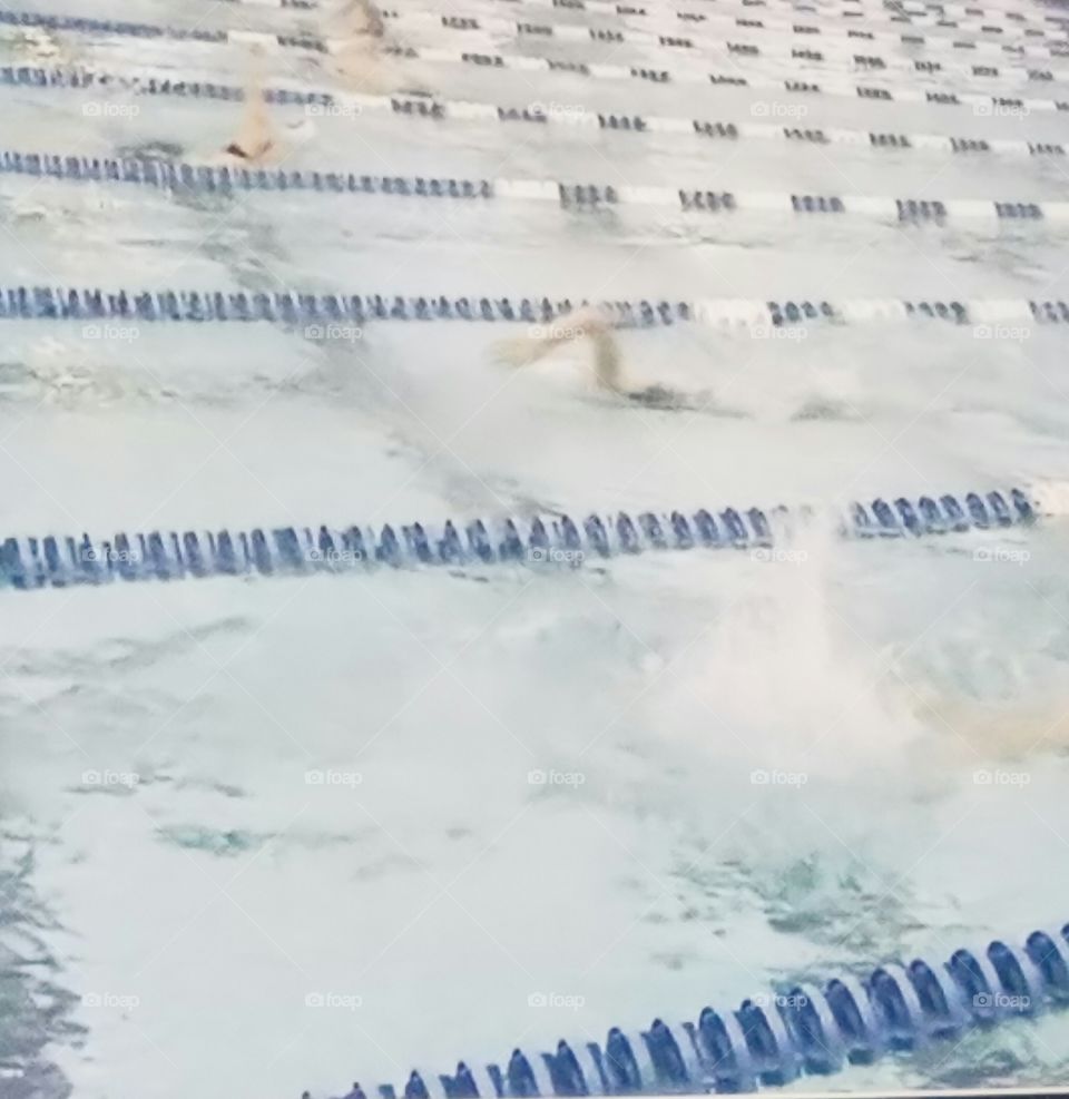 High-school swimming swim meet indoor pool