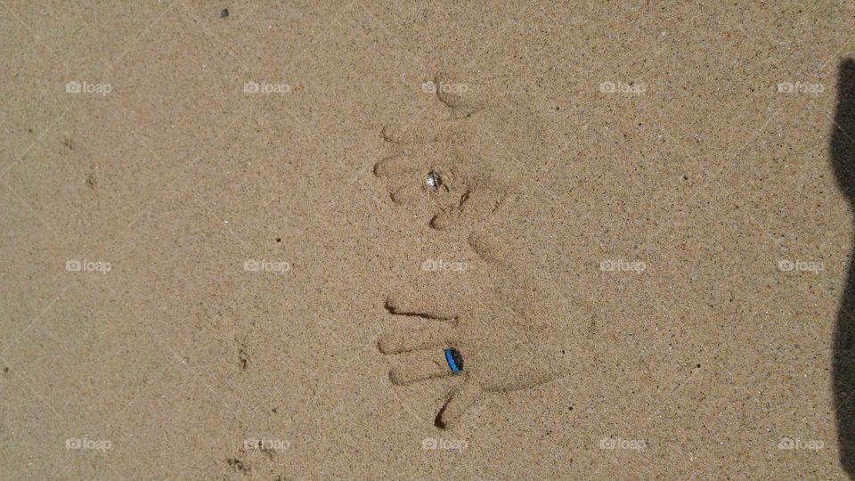 Handprints in the Sand on a Mexico Beach
