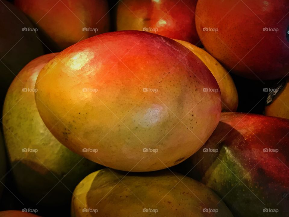 fresh ripe mango in fruit market 