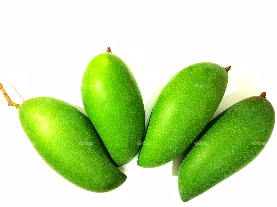 mango green white background mangos