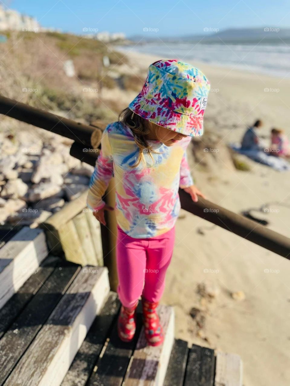 Taking a scroll in tie-dye 