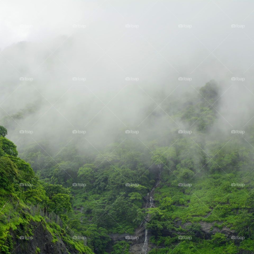 monsoon clouds descended over hills at Lonavala near Mumbai in India