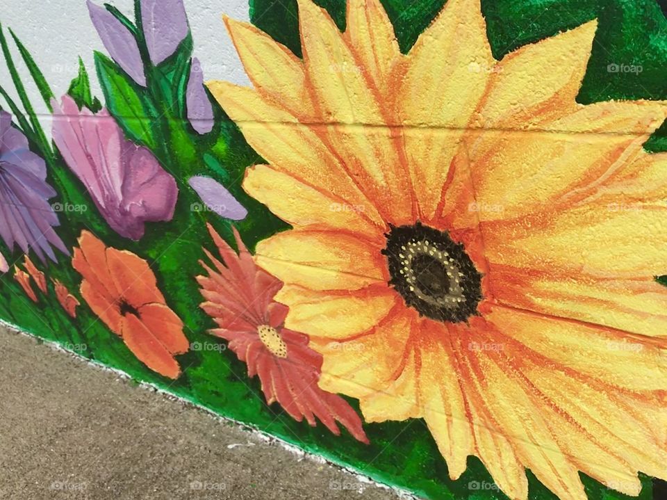 Beautiful flower painting at a local playground. 