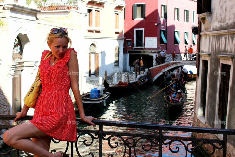 Girl posing in Venice on bridge 