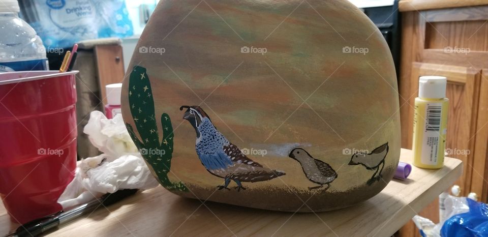 quail painted on rock