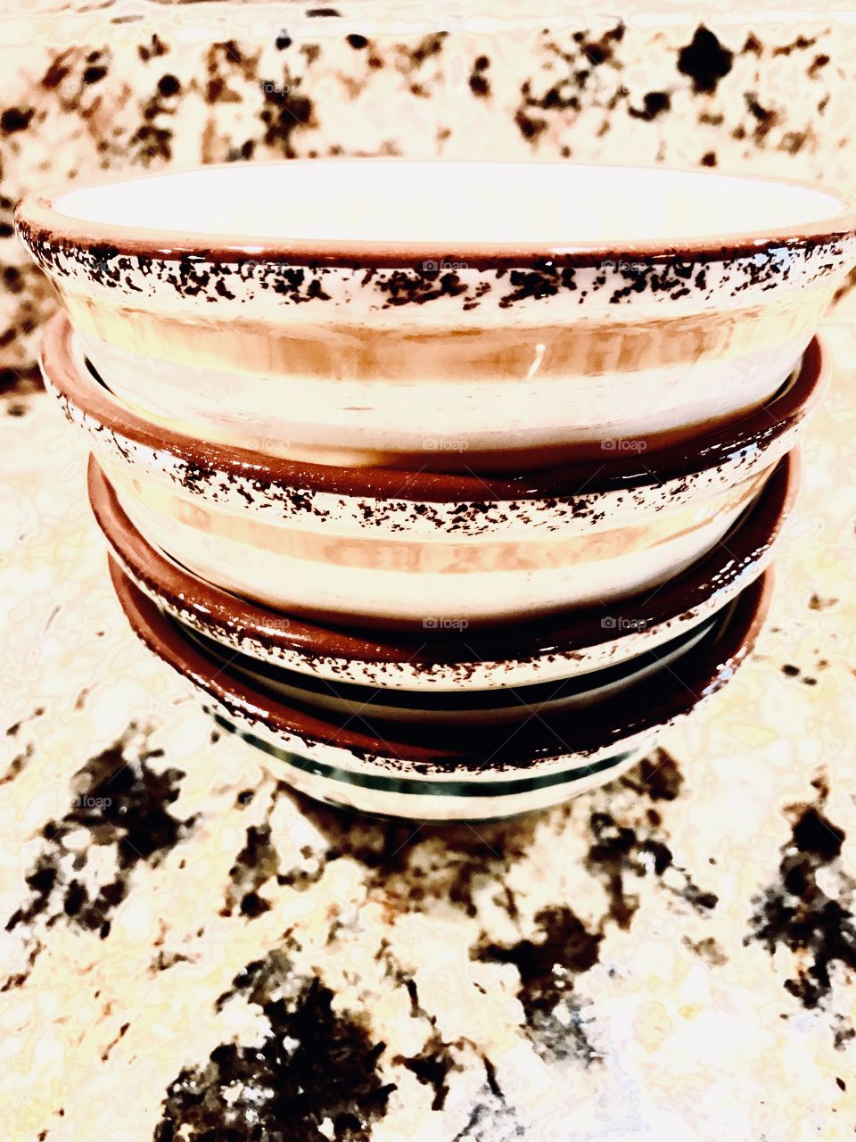 Stacking Of bowl on the counter top .