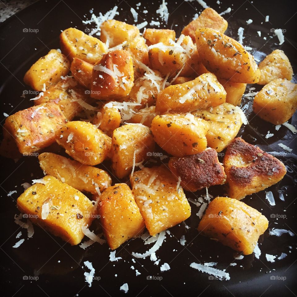 Sweet potato gnocchi with grated Parmesan cheese