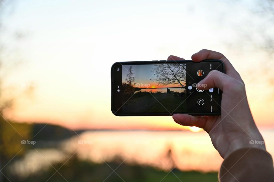 Taking pictures of sunset