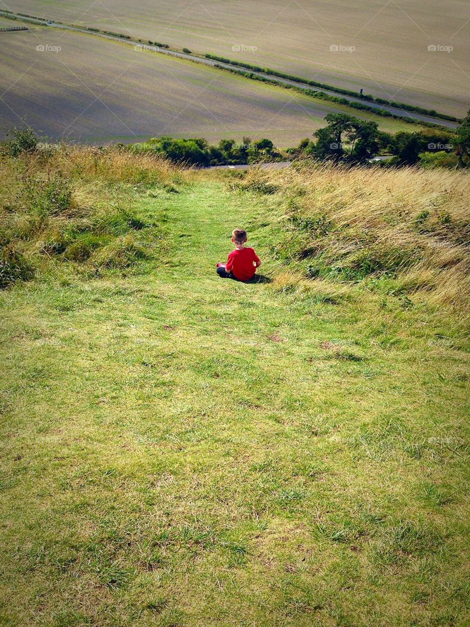 Lone child looking out on world