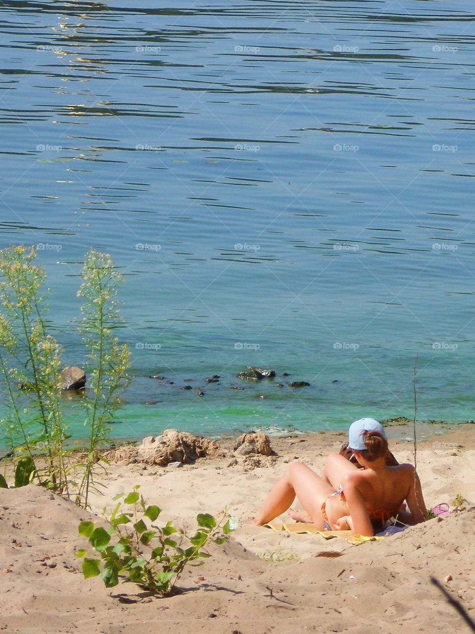 girl on the beach near the river Dnieper