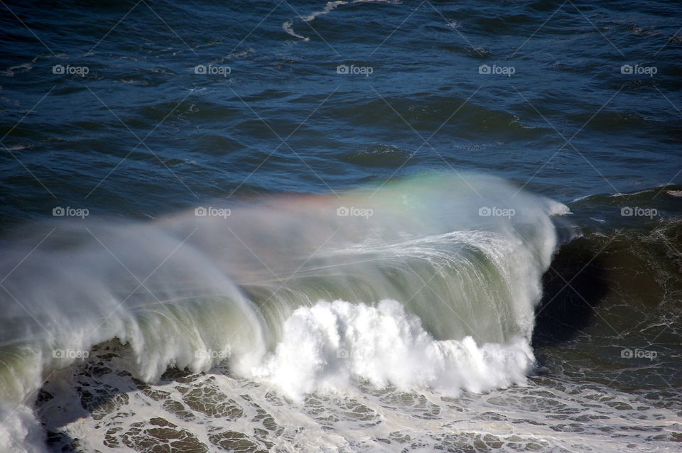 Rainbow in the waves
