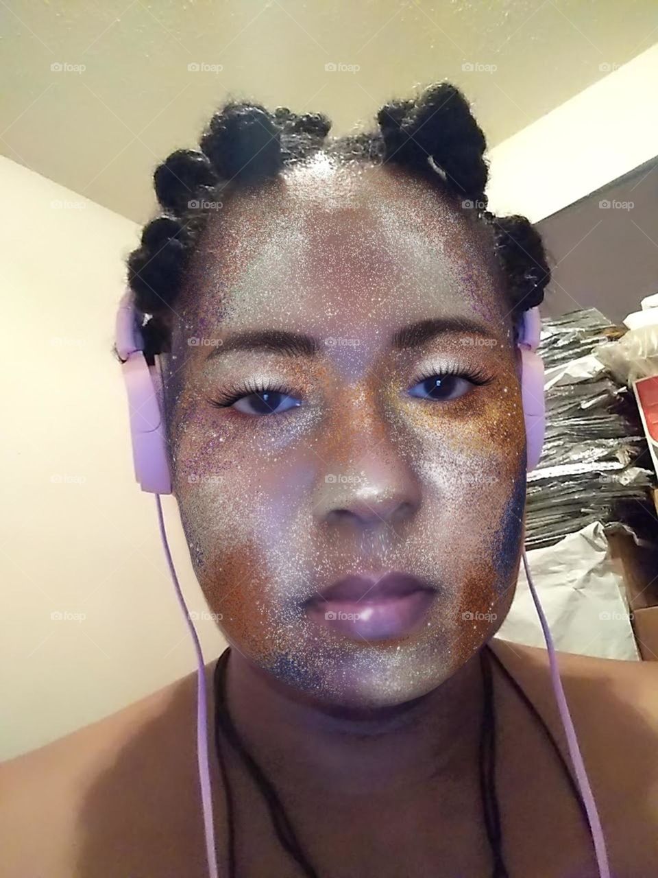 Faceart picture of myself listening to music with pink headphones.
