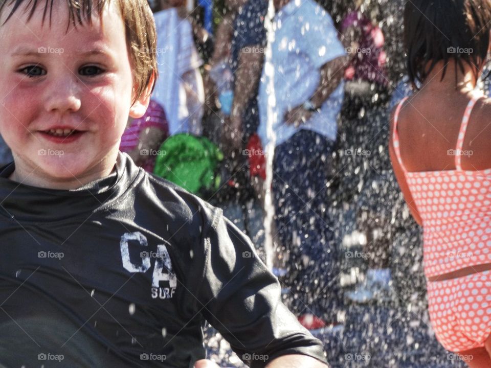 Boy Splashing Joyfully