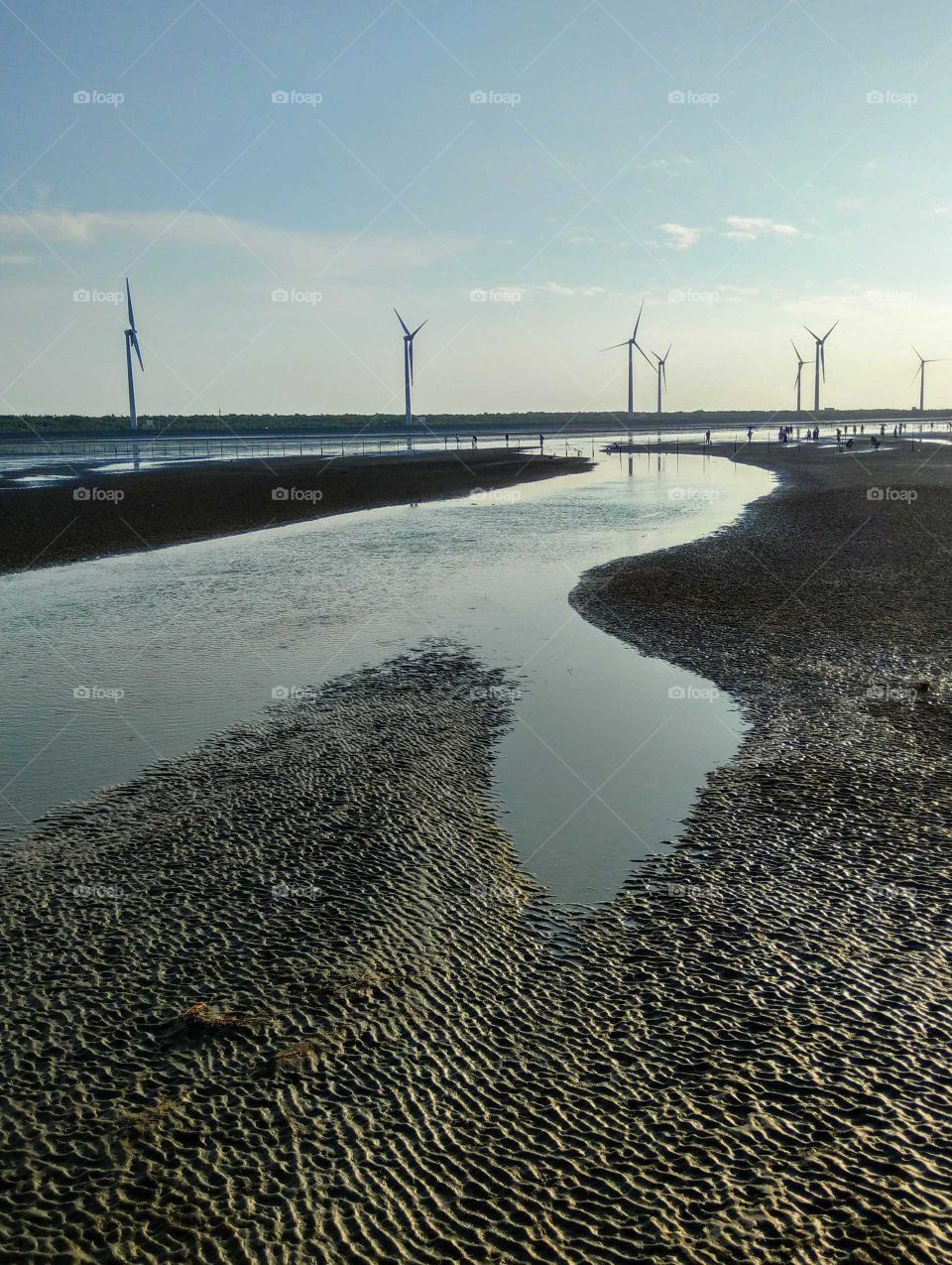 The art of composition: Gaomei Wetland, Taichung, Taiwan. with wonderful coastline, wind farm and ecological landscape.