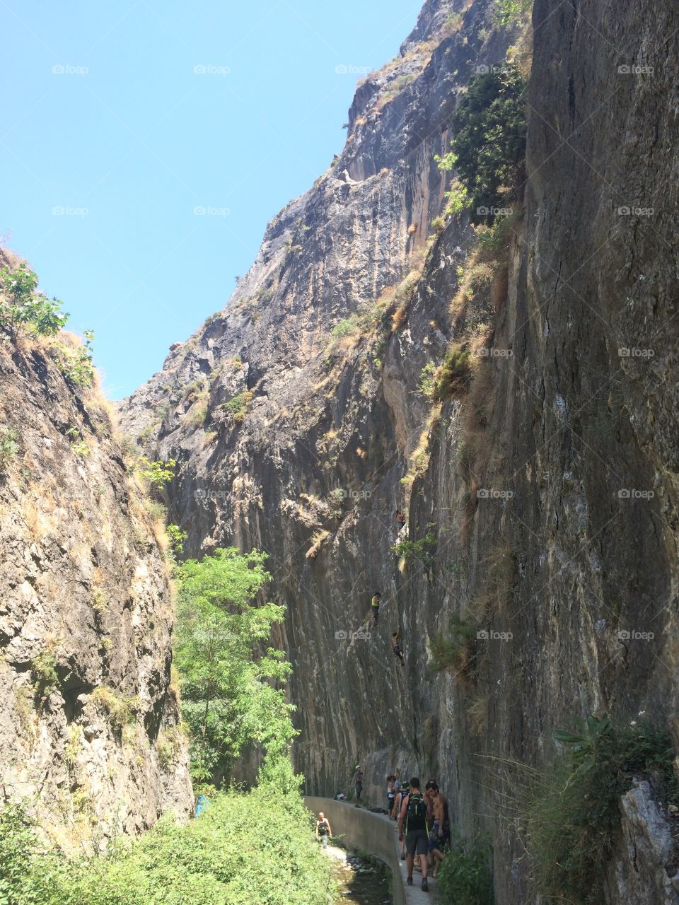 This is a photo I took while traveling throughout Spain on a Backpacking trip in 2015. My friend and I spent the day by a creek and saw many people scaling the rock face. View my profile for more photos around Europe, India, and Australia.