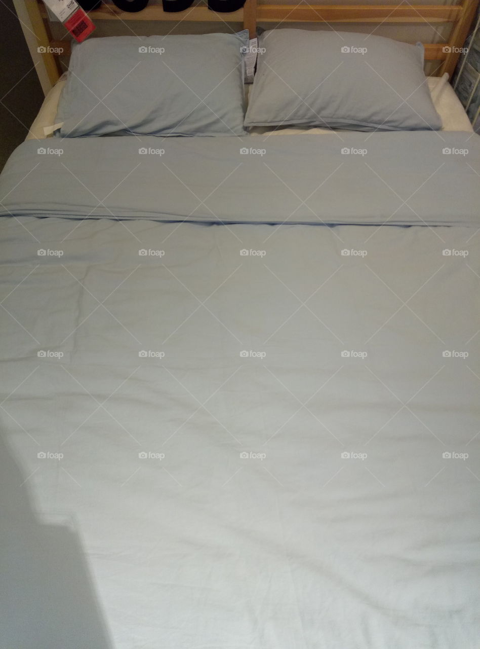 Bed linen for a double bed in light blue color