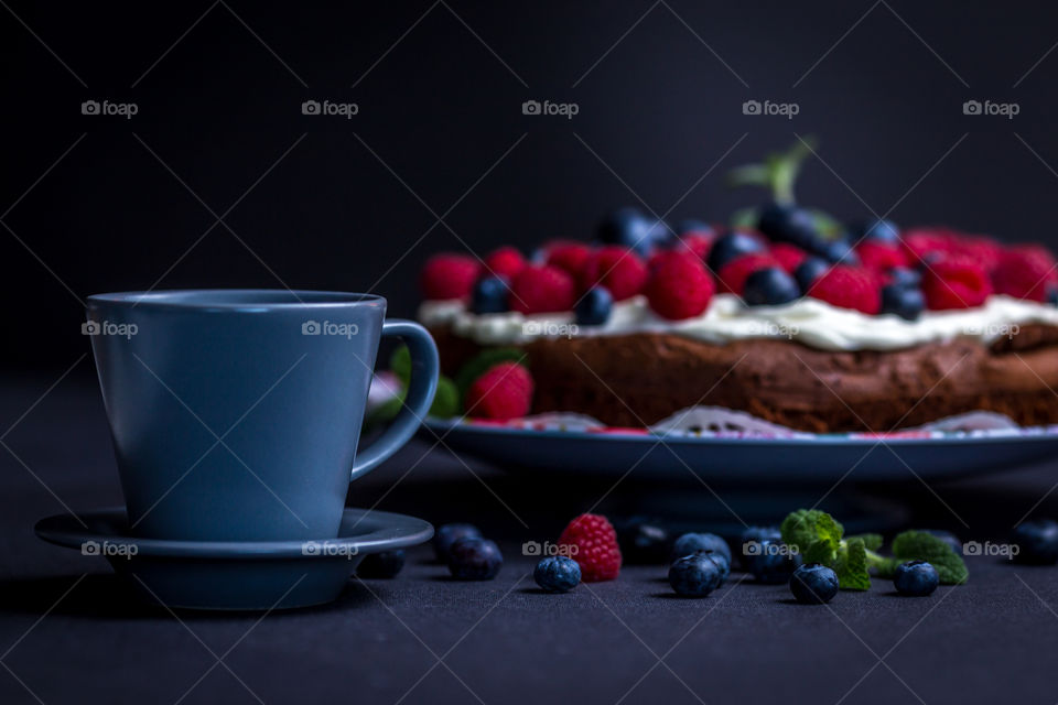 Close-up of cake and coffee cup