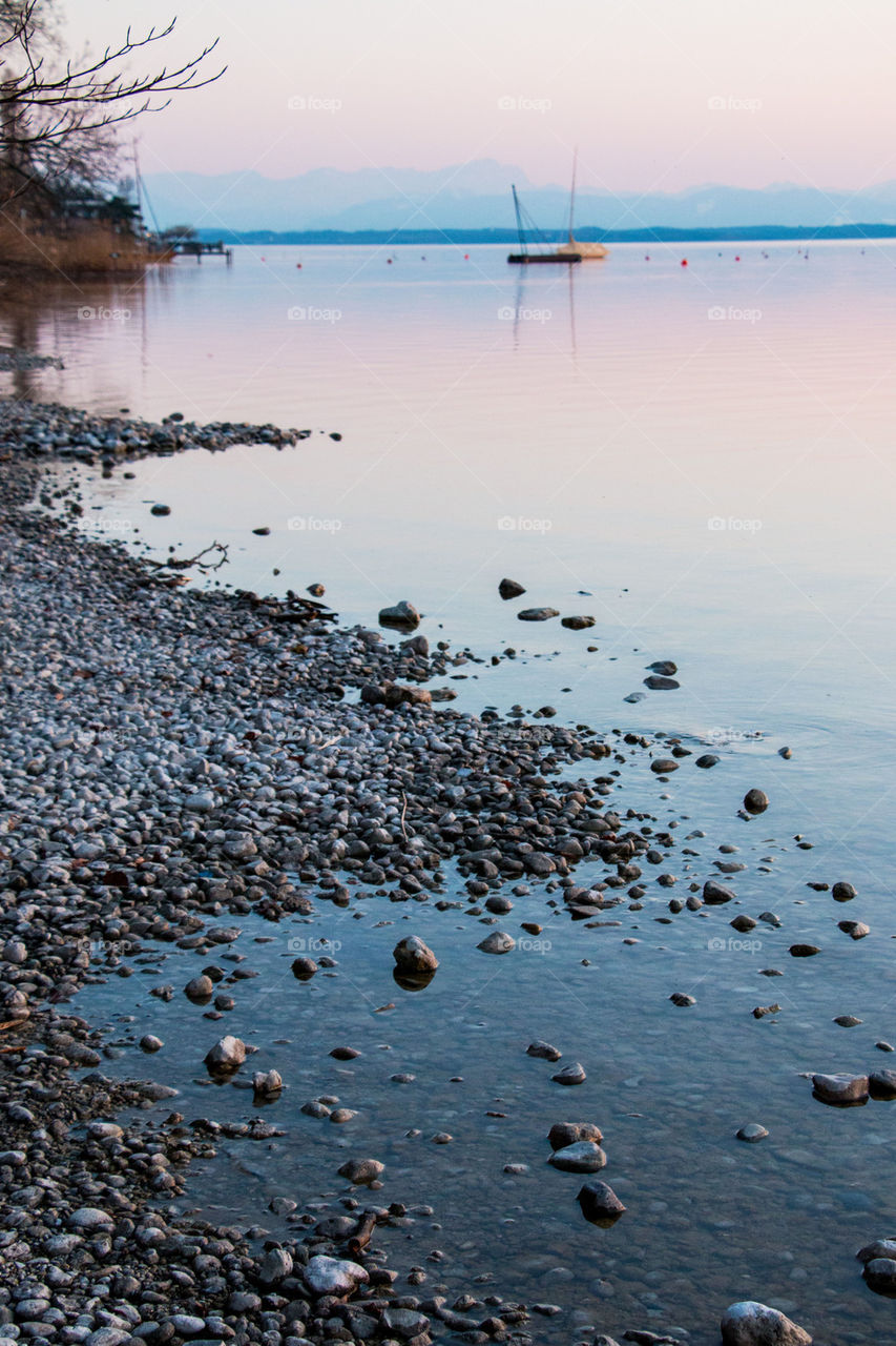 Scenic view of lake during sunset