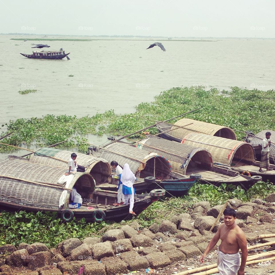 burriganga River life . Day trip out of meltingpot dhakacity. we are ready for a boatride