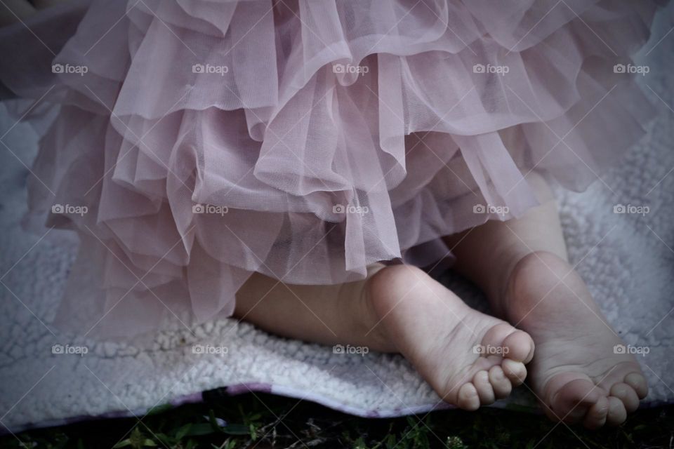 Baby feet in tutu