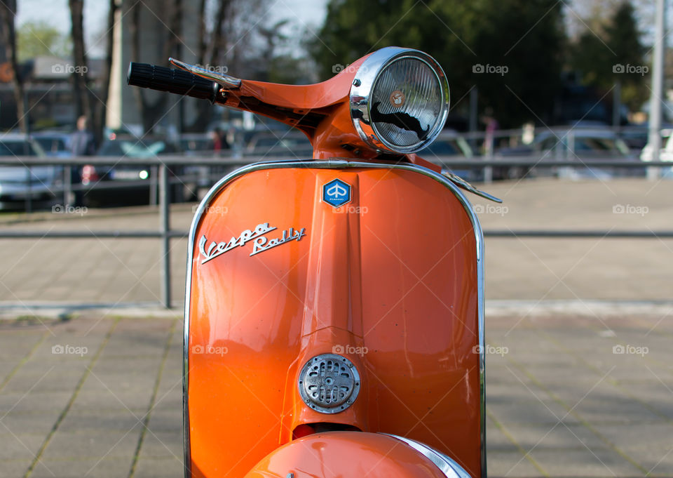 vespa rally orange motorcycle from 1981