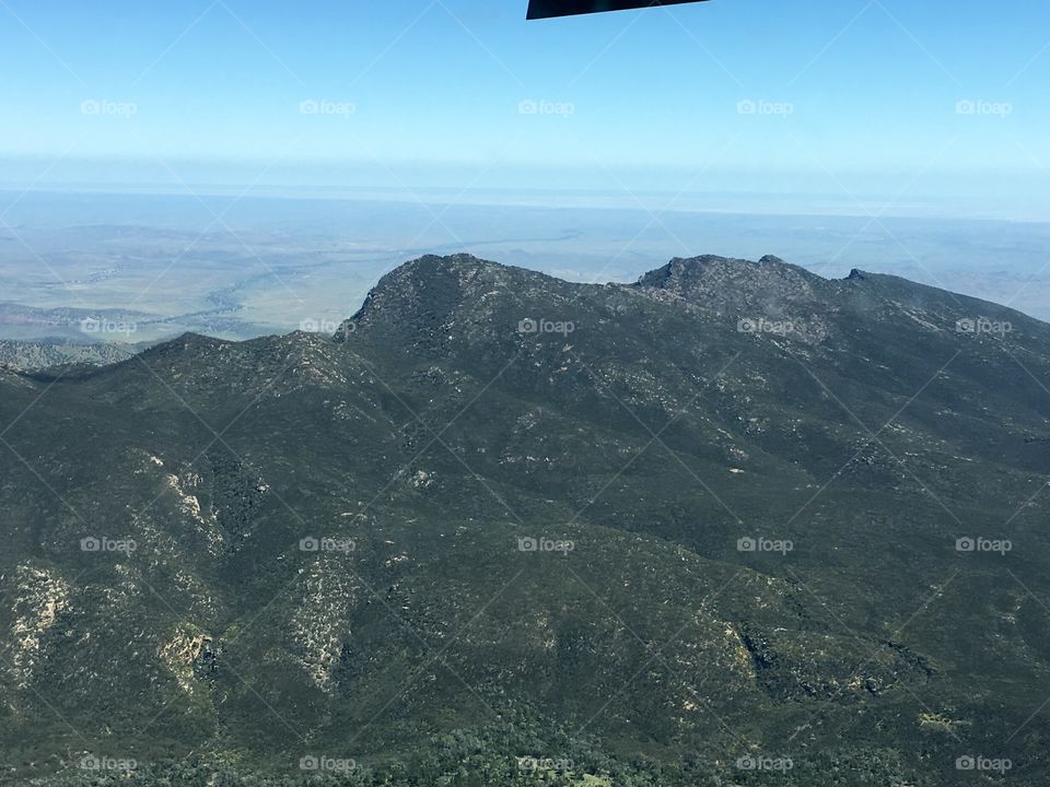 Aerial view from a light plane in Springtime of the flinders Ranges, a rare sight to see the mountains so colourful as we have had an unusually high amount of rainfall this spring 