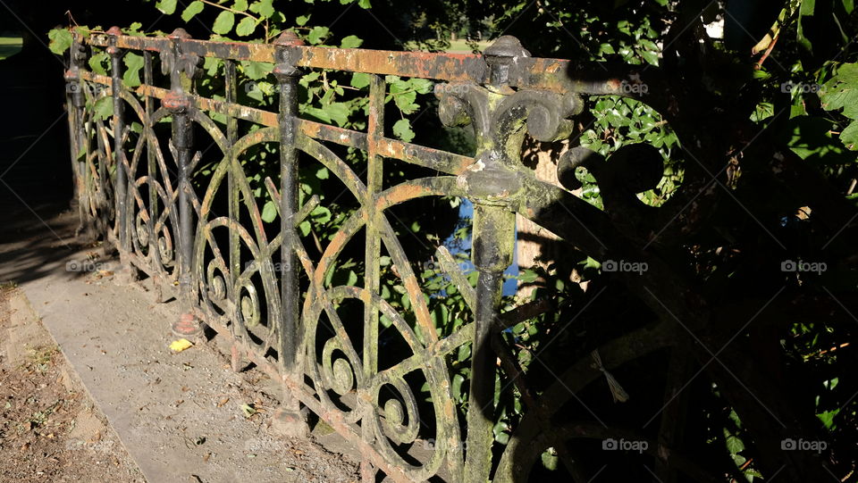 Old fence in a park in Antwerp