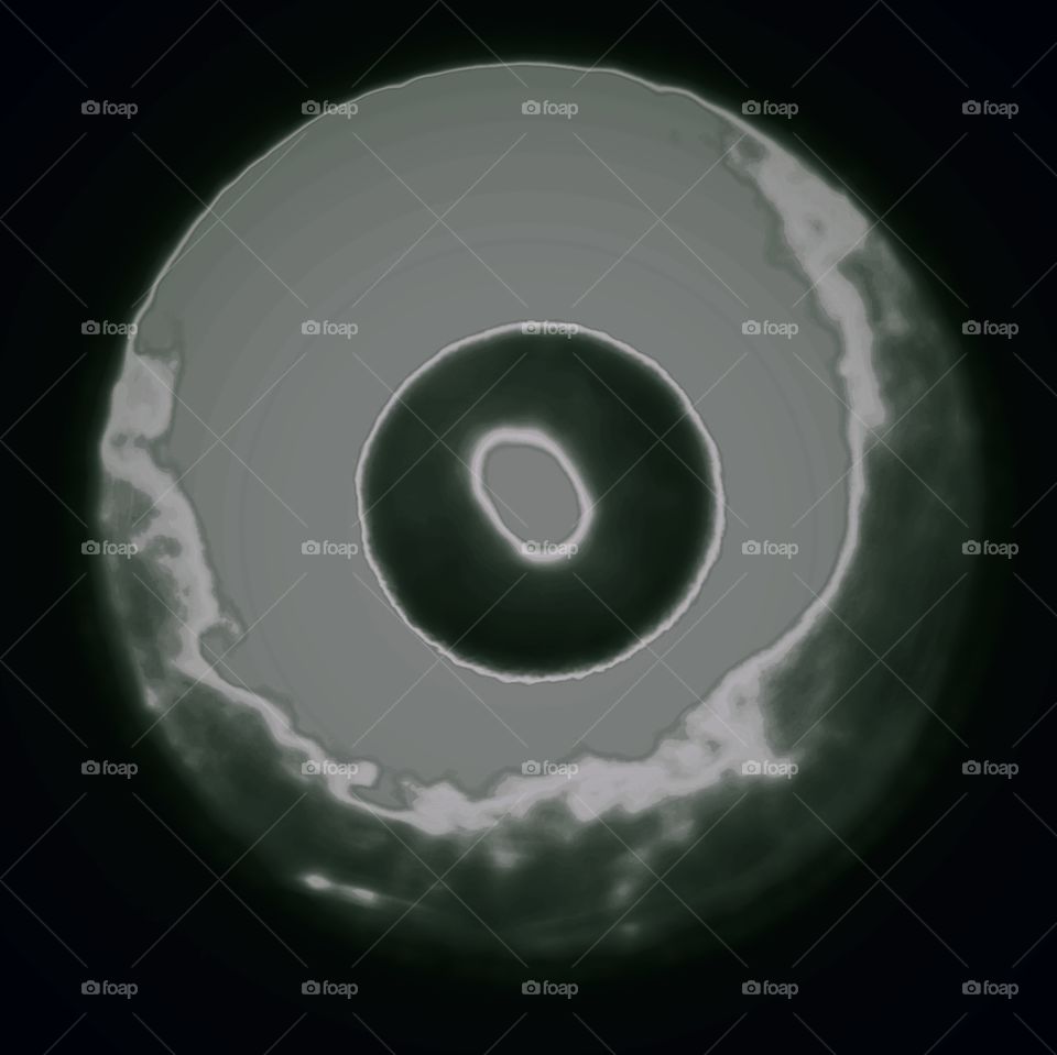 This is an illusion of the reflection of light from a handheld flashlight and this is only fictitious just using light to make an illusion