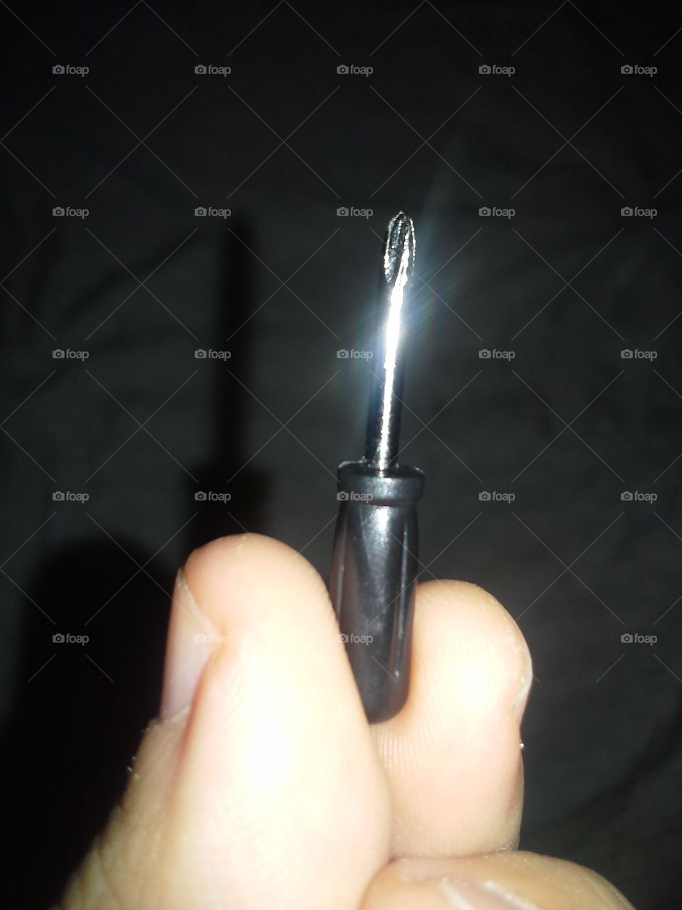 a really tiny screwdriver