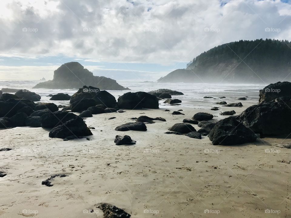Beautiful sunny day at the beach during low tide. Perfect day for a stroll on the beach. 