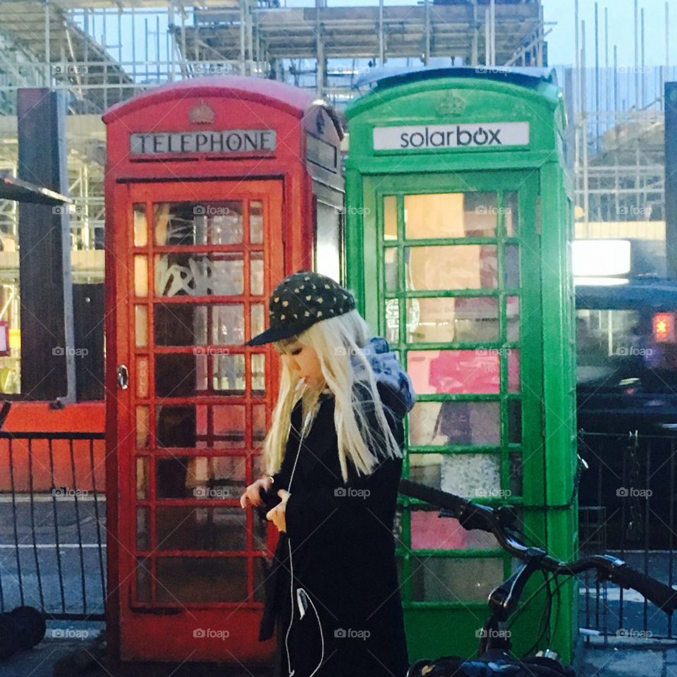 smiling by the telephone