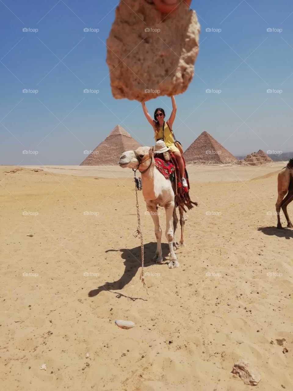lovely photo with background panorama view pyramids very natural color and beautiful photo.
