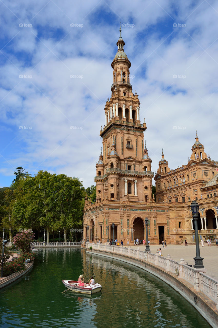 Paddleboat rowing in the canal at Plaza de España, Sevilla, Spain.