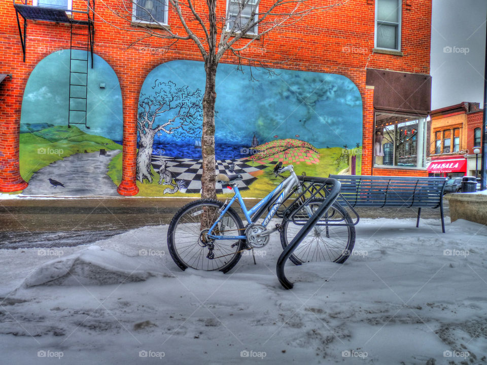 blue bike in snow iowa city