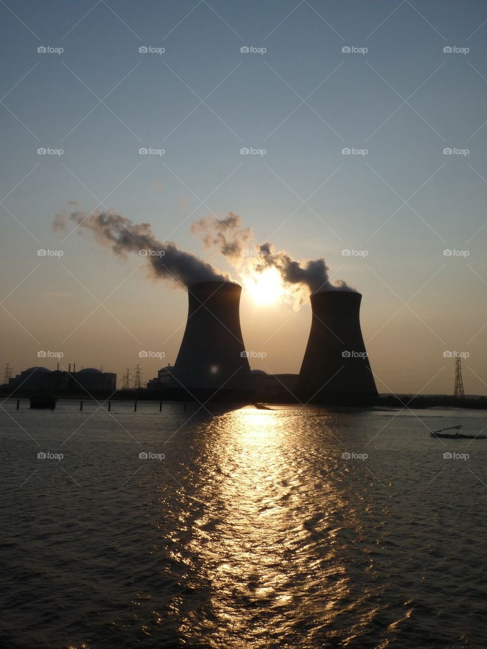 Sun between power plants