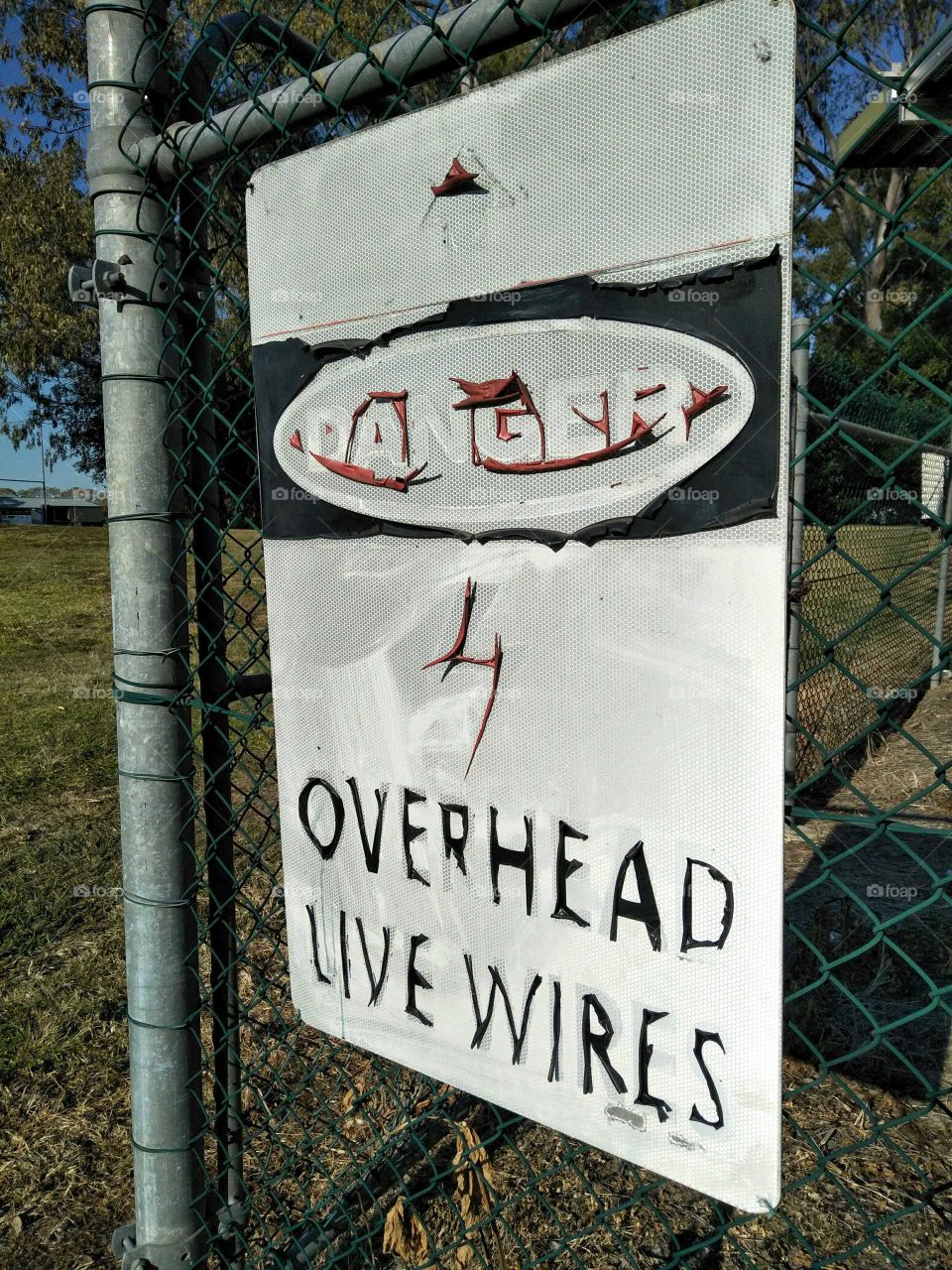 danger sign overhead wires