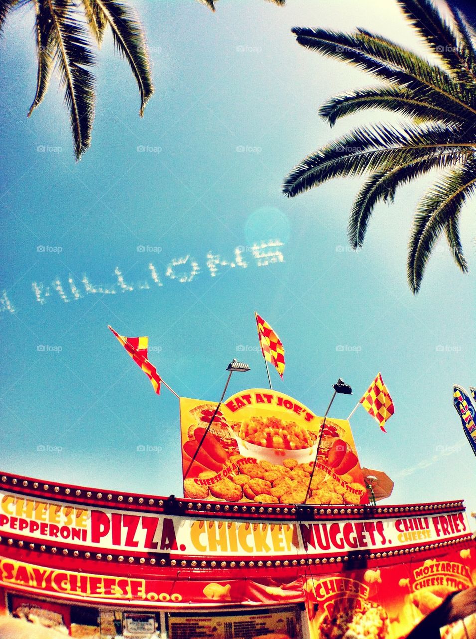 State fair food stand and palm trees in California 