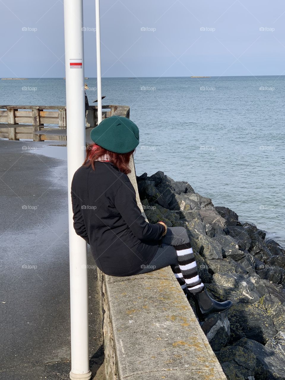 Reflecting by the sea on a cool summer day