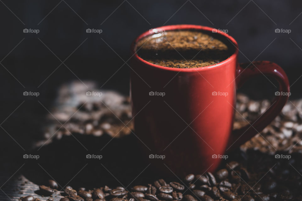 Fresh coffee with red mug