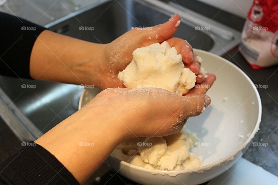 Woman preparing food in kitchen