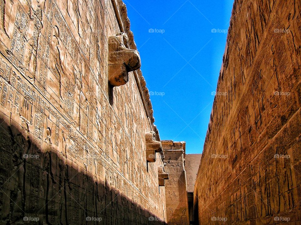 Flanked by the ancient wall of Eygpt.