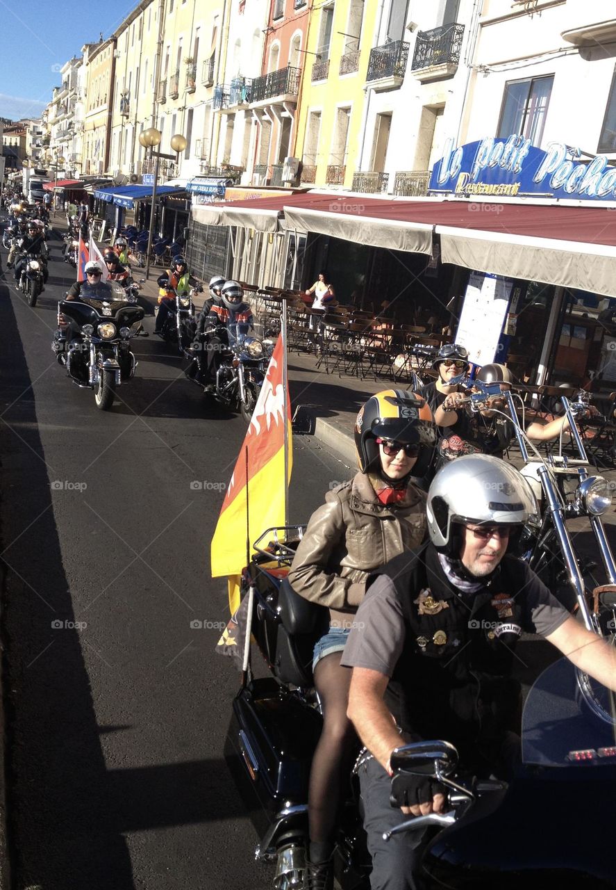 Motorbikes convoy flags on main road in France