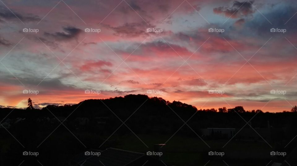 Sunset over hill