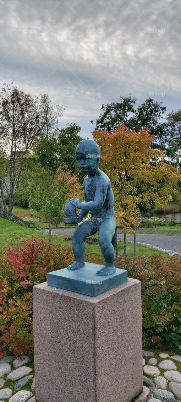 Park and statue in autumn colours