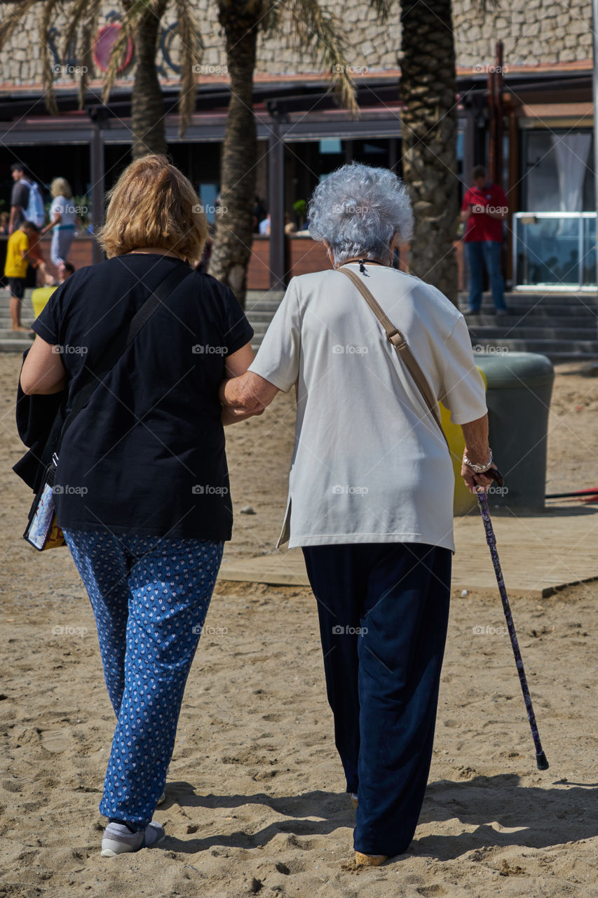 Old couple walking